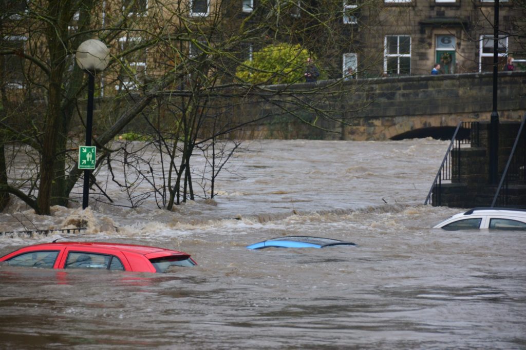 Cars submerged in water during flood