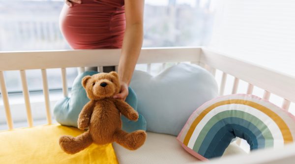 Pregnant holding the teddy bear